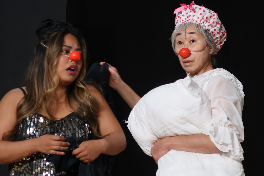 Jennifer in a clown exercise with experienced clown Yuriko Ogino.